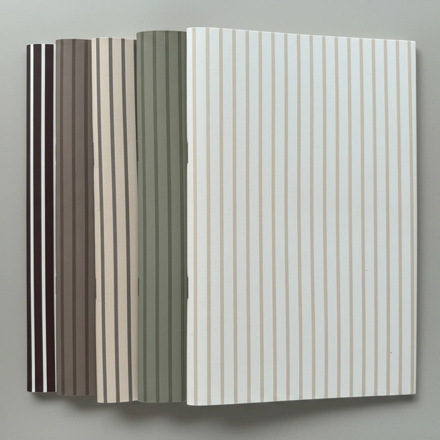 Color swatch book with striped patterns on a gray background
